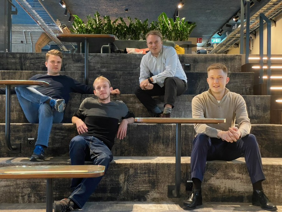 Asteria team members sitting in an office